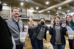 January 14, 2022: Senators Amanda Cappelletti and Sharif Street participate in the 2022 Celebrity Cow Milking Contest.